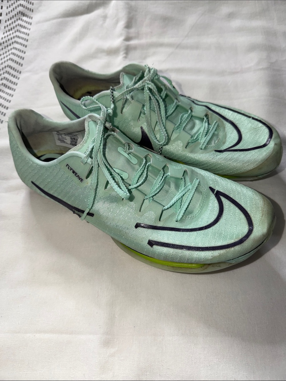 Nike Men’s Mint Green Flyweave Athletic Shoes with Black Accents
